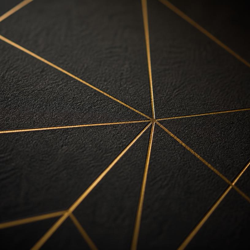Gold foil detailing on dark textured paper